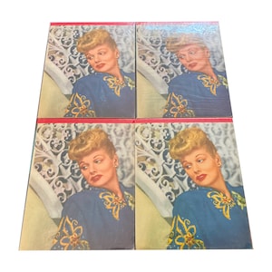 Lot of 4 rare 1940s blank writing tablets featuring Lucille Ball on the cover. One has minor corner wear - see pics. 21 lined pages.