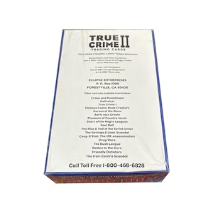 May include: A sealed box of "True Crime II Trading Cards" with a white and blue design. The box features the title, Eclipse Enterprises information, and a list of related card sets. The text includes "Serial Killers and Mass Murderers."