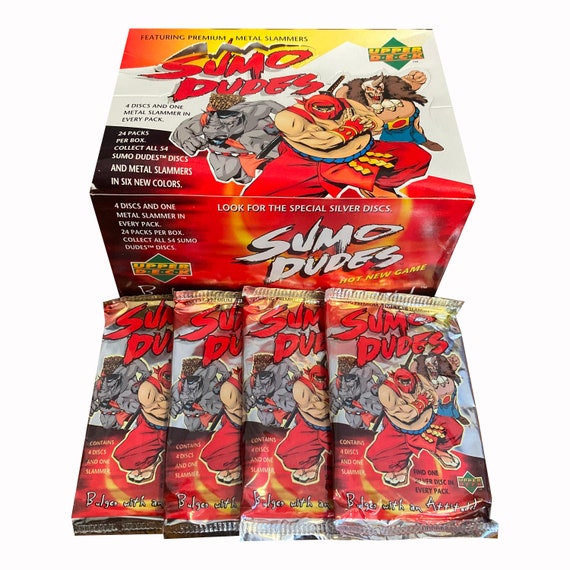 4 Packs of Sumo Dudes Pogs. 4 Milk Caps and 1 Metal Slammer in