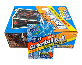 1 pack of 1992-93 Topps NBA Basketball Series 1 vintage trading cards. 15 picture cards including 1 ToppsGold card per pack. Topps 1992.