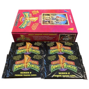 4 pakken Mighty Morphin Power Rangers Series 2 premium ruilkaarten. 7 kaarten + 1 "power foil" kaart in elk pakket. 1994.