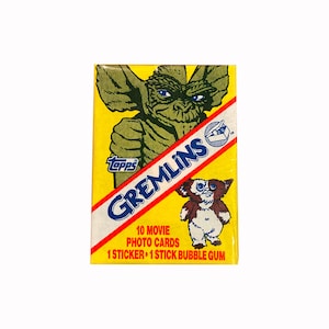 Gremlins vintage Sammelkarten-Wachspack. 10 Karten + 1 Sticker. Sehr schöner Gesamtzustand. Topps 1984. Gizmo! Gestreift! Klassiker aus den 80ern!
