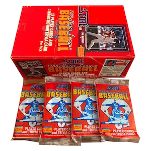 4 packs of 1988 Score vintage MLB Baseball cards. 17 player cards and 1 Magic Motion Trivia card per pack. Collect them all! Score 1988.