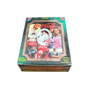 Factory sealed box of Coca-Cola Super Premium Collection vintage trading cards. 24 packs. Each card is foil stamped. Collect-A-Card 1995.