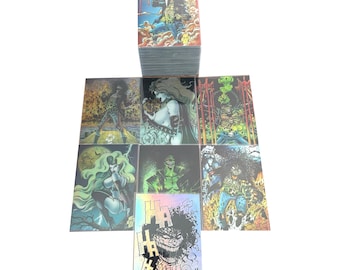May include: A collection of comic book trading cards featuring various characters in vibrant colors. The cards display detailed illustrations of figures with dynamic poses and bold outlines. A stack of cards is visible, along with several individual cards.