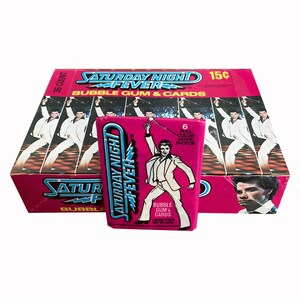 Cartes à collectionner vintage de la Fièvre du samedi soir ! 1 paquet de cire contenant 6 cartes de films. Dès la sortie de la boîte. Donruss 1977. John Travolta ! Rares !