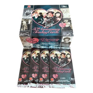 4 packs of I Love Lucy 50th Anniversary vintage trading cards. 6 cards per pack. Randomly inserted special cards! Dart Flipcards 2001.