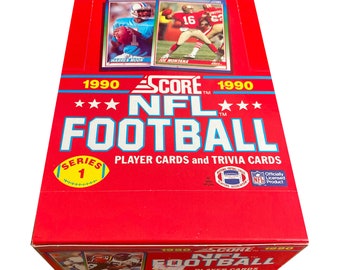 Full box of 1990 Score NFL Football cards. Series 1. 36 packs, 16 player cards and 1 Magic Motion Trivia Card per pack. Collect them all!