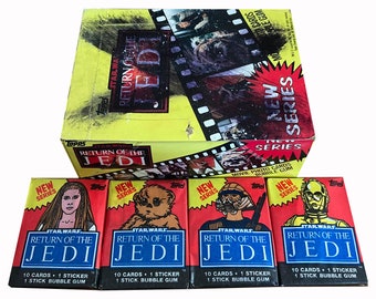 1 pack of Star Wars Return of the Jedi Series 2 vintage trading cards. You choose the wrapper! 10 Cards + 1 sticker per pack. Topps 1983.