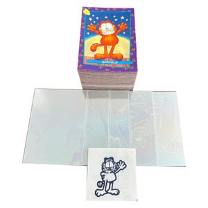 Garfield Premier Edition complete set of 100 vintage collector cards + 5 holograms + 9 tattoos in excellent condition. Skybox 1992. Rare!