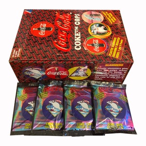 4 packs of Coca Cola Coke Caps vintage pogs. 5 milk caps per pack. Randomly inserted plastic slammers. Collect-A-Card 1995.