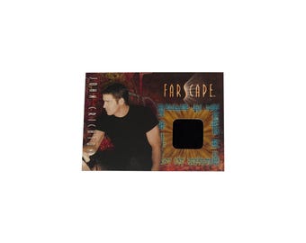 Farscape vintage costume card C12 featuring costume material from Captain John Crichton. Produced by Rittenhouse.