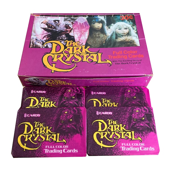 4 packs of The Dark Crystal vintage trading cards. Sealed wax packs. Includes 8 full-color cards. Dunross 1982. Collect them all!