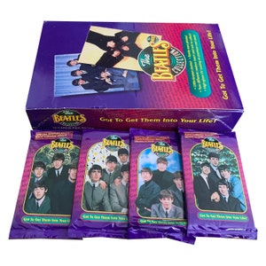 4 packs of The Beatles Collection vintage trading cards. 10 cards per pack. Released in 1993. Got to get them into your life!