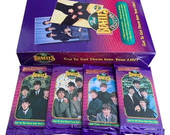 4 packs of The Beatles Collection vintage trading cards. 10 cards per pack. Released in 1993. Got to get them into your life!