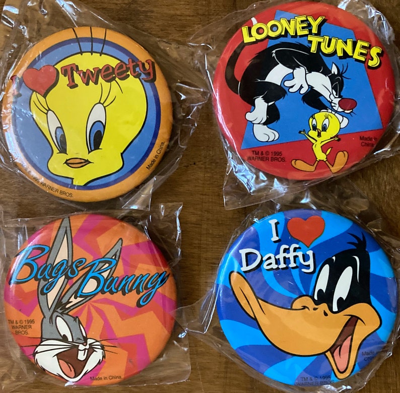 4 vintage Looney Tunes buttons. Your choice of 4 from 12 different designs. 2 1/4" buttons. See item description for details. Great deal! image 2