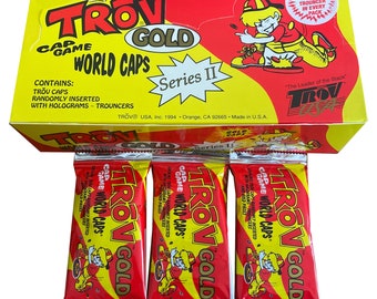 3 packs of Trov Gold World Caps Series II vintage pog packs. Each pack contains Trov Caps and 1 Trov Trouncer. Released in 1994.