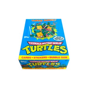 Caja de cartas coleccionables vintage de las Tortugas Ninja VACÍA. Excelente estado general, sin marcas negras. Sin cartas. Topps 1989.