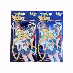 2 pacotes de adesivos vintage da série Sailor Moon 2. 5 adesivos + 1 adesivo de prisma por pacote. Colecione todos! Caixa de arte de 1999.
