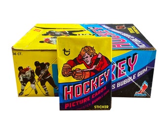 1 pack of 1978 Topps NHL Hockey vintage picture cards. Player cards plus 1 sticker in every pack. Collect them all! Topps 1978.