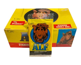 1 pack of ALF Series 1 trading cards. Rarely seen UK version. Released by Topps Ireland in 1987. "No problem." Rare ALF collectible.