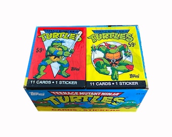 2 jumbo packs of Teenage Mutant Ninja Turtles vintage trading cards. 11 cards and 1 sticker per pack. Mondo to the max! TMNT. Topps 1989.