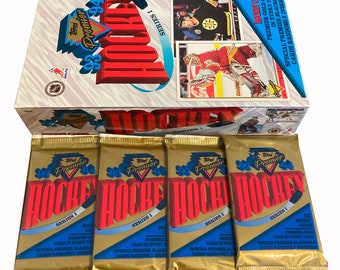 4 packs of 1993-1994 Topps Premier vintage NHL hockey cards. Series 1. 12 cards per pack. Topps 1993. Nice NHL collector&#39;s item!
