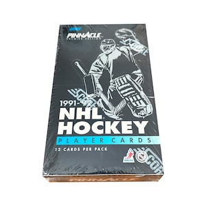 Factory sealed box of 1991 Score Pinnacle Premier Edition NHL Hockey cards. 36 packs, 12 cards per pack. Lots of classic NHL stars!