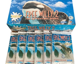 6 packs of Free Willy 2: The Adventure Home vintage trading cards. 8 cards including 1 "pop-out card" per pack. Skybox 1995.
