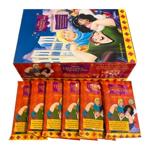 6 packs of Disney&#39;s Hunchback of Notre Dame trading cards. Each pack contains 11 cards including finger puppet, puzzle, and more!
