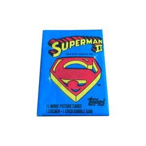 1 pack of Superman II vintage trading cards. Sealed wax pack containing 11 cards and 1 sticker. Topps 1980. Christopher Reeve.