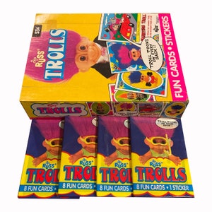 4 packs of Russ Trolls vintage trading cards. 8 fun cards and 1 sticker per pack. Troll toons on every back! Topps 1992. Collect them all!