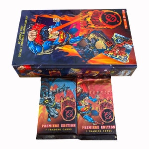 2 packs of DC Outburst Firepower vintage trading cards. DC Comics' first totally embossed trading cards! 7 cards per pack. Fleer/Skybox 1996
