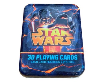 Star Wars 3D playing cards. Brand new deck factory sealed in attractive embossed storage tin. Nice Star Wars collectible!
