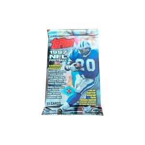 1 pack of vintage 1997 Topps Football cards. 11 cards per pack. Random inserts. Nice NFL collectible. Topps 1997. Collect them all!