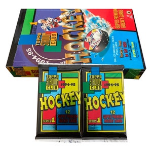 2 paquets de cartes de hockey de la LNH Topps Stadium Club, série 1 1994-95. 12 cartes par paquet. Cartes de poursuite insérées au hasard. Topps 1994.