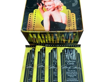 4 packs of Marilyn Monroe Series II vintage trading cards. 9 foil stamped cards per pack. Sports Time Card Co. 1995. Collect them all!