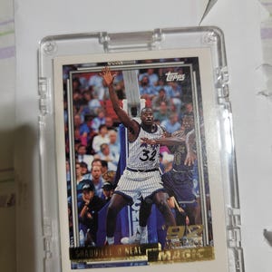 Tarjeta Topps de Shaquille O'Neal 1992-1993 (Dorada)