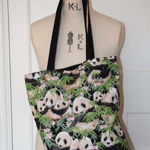 bolso de mano con oso panda