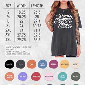 May include: Dark grey unisex garment-dyed t-shirt with the text "Your Design Here". The shirt has a relaxed fit and is made of 100% ring-spun cotton. Available in various colors, including black, pepper, and blue jean. Sizes range from S to 4XL.