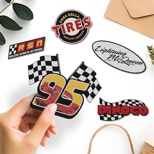 May include: Embroidered patches featuring racing themes. Designs include "Casa Della Tires", "Racing Sports Network", "Lightning McQueen", "Dinoco", and a number "95" with racing flags. The patches are in various colors, including red, black, and yellow.