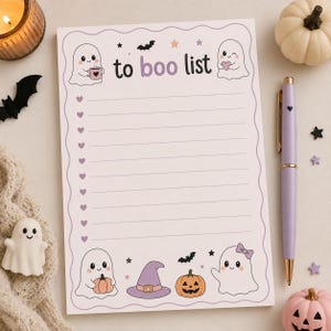 May include: A rectangular notepad with a scalloped border featuring the text to boo list at the top. The page includes lined sections with heart-shaped bullet points, decorated with illustrations of ghosts, pumpkins, a witch hat, and bats.