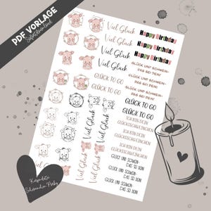 Puede incluir: Una hoja de pegatinas imprimible con ilustraciones de cerditos y texto en alemán e inglés. El texto incluye "Viel Glück" (que significa "Mucha suerte"), "Feliz cumpleaños" y "Glück to Go".