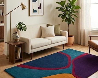 Alfombra de lana tejida a mano: arte abstracto moderno con bloques de colores en azul, morado y naranja.