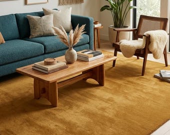 Hand-Tufted Ochre Wool Rug: Solid Color, Plush Texture