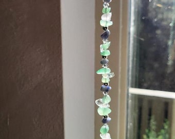 Aventurine gemstone and crystal Suncatcher.  Enhances a healing and calming effect.  10"L