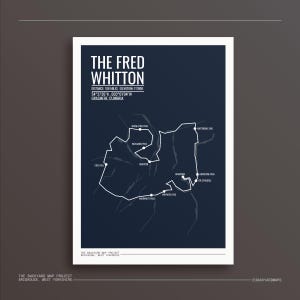May include: A navy blue poster featuring a white line map and text. The text reads "THE FRED WHITTON", with distance, elevation, and coordinates. The map shows a route with labeled points, including "The Struggle".