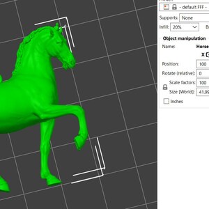 May include: A green plastic horse figurine, approximately 4.2 inches long, 4 inches wide, and 1.3 inches tall. The horse is standing on all four legs with its head held high. It has a small loop on its back, suggesting it may be a charm or ornament.