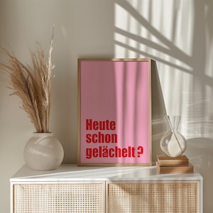Have You Smiled Today? poster in red and pink tones with positive typography design. Modern wall art for home office, living room, or as a cheerful happiness gift.