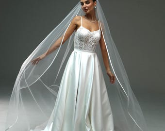 Elegant wedding veil with satin edge – long fingertip-length veil with ribbon trim | Classic chapel-style veil